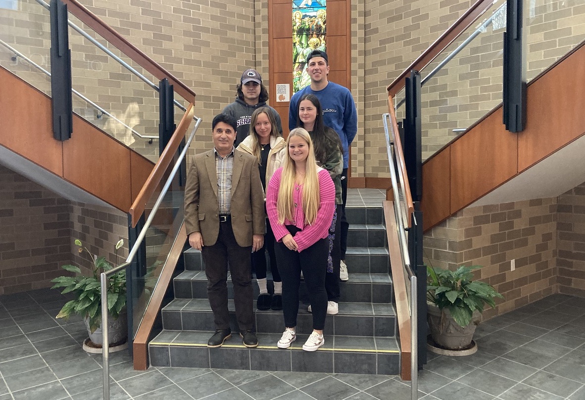 Dr. Peter Andersen with several students from his Introduction to Marketing course who are taking part in the NASA's Technology Transfer University (T2U)