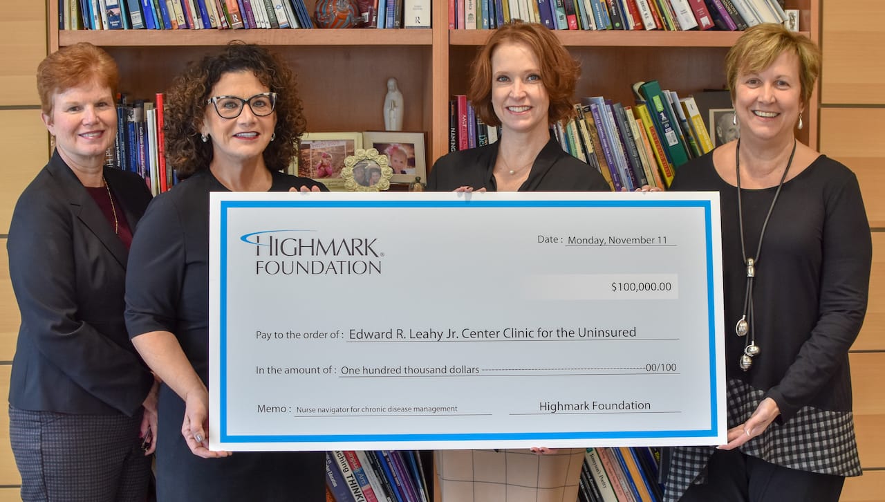 The Highmark Foundation awarded a $100,000 grant to The University of Scranton’s Edward R. Leahy Jr. Center Clinic for the Uninsured to support its efforts in chronic disease management among a vulnerable population. From left: Meg Hambrose, director of corporate and foundation relations at the University; Andrea Mantione, D.N.P., director of the University’s Leahy Community Health and Family Center; Jane L. Brooks, program manager for Highmark Foundation; and Debra Pellegrino, Ed.D., dean of the University’s Panuska College of Professional Studies.