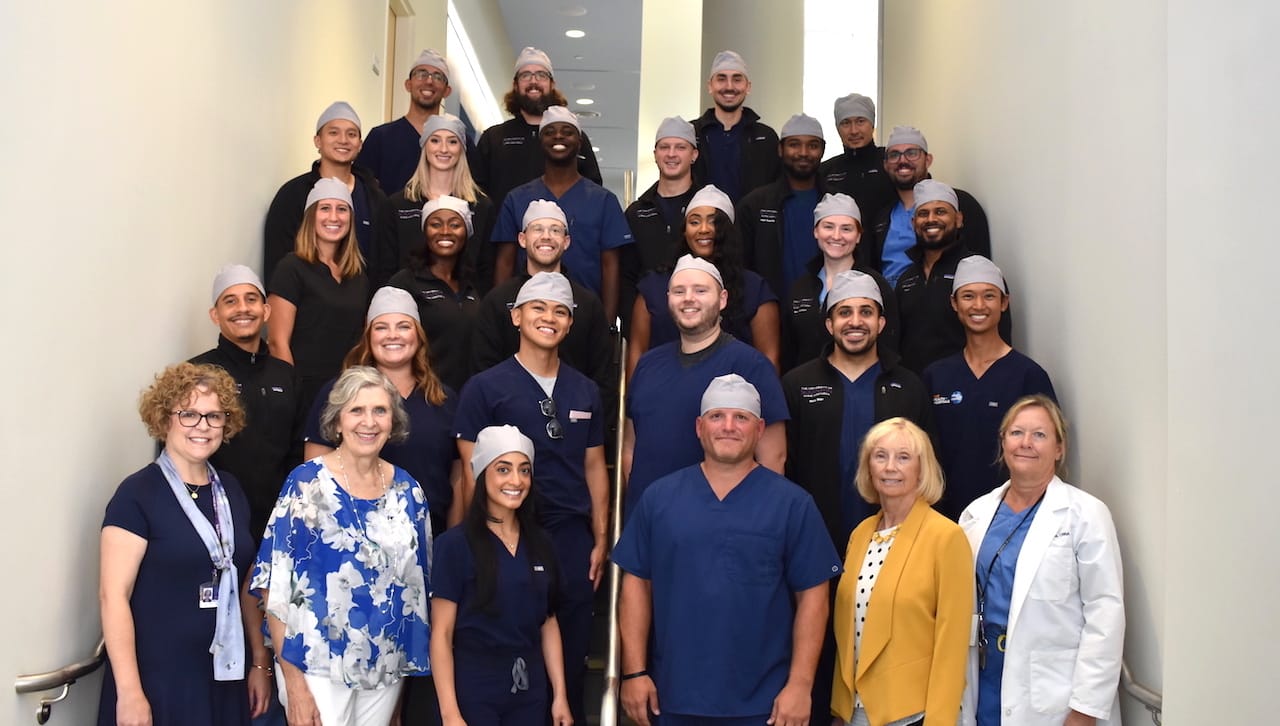 The University of Scranton held a capping ceremony for members of its class of 2024 graduate nurse anesthetist program who completed the rigorous first-year academic course requirements of the program and now will begin the clinical rotation portion of the three-year master’s degree program. First row, from left: Mary Jane DiMatteo, Ph.D., professor of nursing and interim associate dean of the Panuska College of Professional Studies; Margarete Zalon, Ph.D., professor of nursing; Samantha Valle; Erik Steffens; Ann Culp, D.N.P., faculty specialist, nursing; and Susan Elczyna, Ph.D., faculty specialist, nursing. Second row: Nelson Ramos; Meghan Visalli; Rolando Flores; William Bianco; Raza Mian; and Jeff Yalun. Third row: Toni Baran; Deborah Antwih; Gabriel Bigatel; Starr Jackson; Tess Nidetch; and Vincent David. Fourth row: Calvin Ngo; Kelsey Davis; Isaac Osei-Wusu; Graham Bigsby; Adam Nugdalla; and Aaron Crowell. Fifth row: Boris Lukatskiy; Elijah Emmons; Kevin Constantinescu; and Umid Iskhakov.