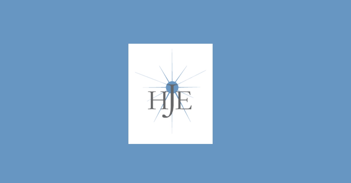 Jesuit Higher Education logo on blue background